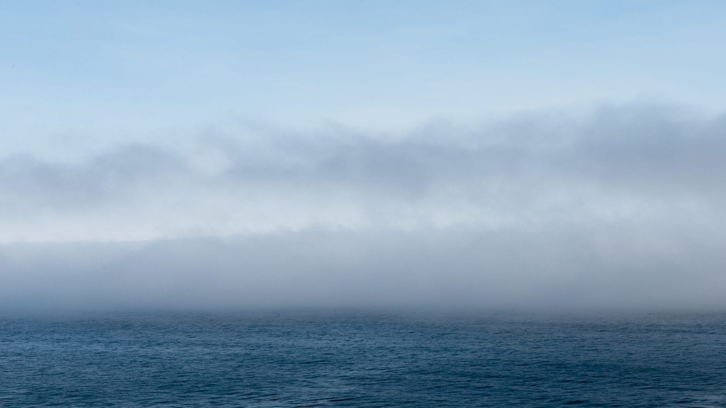 Seascape with fog on the Pacific Coast, photography by Jeff Kauffman